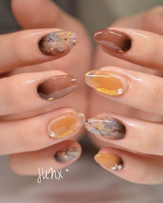 Manicure design in brown and yellow tones