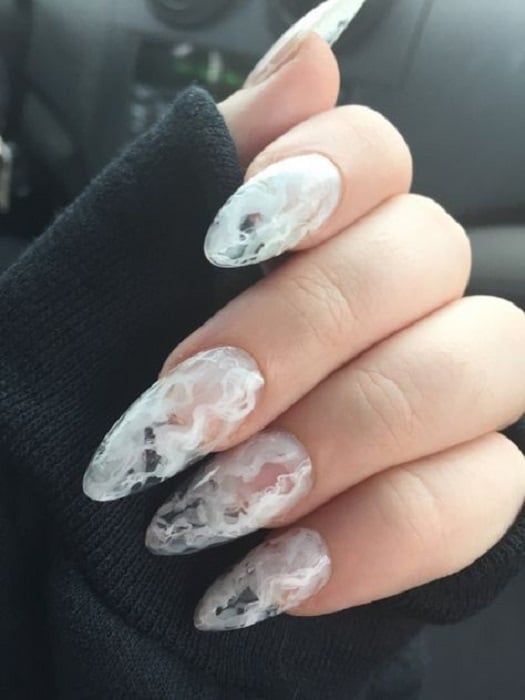 Manicure design in white and transparent tones