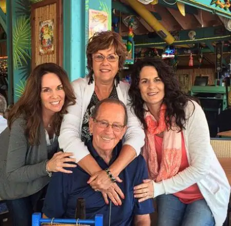 Beth Shuey with her parents and sister.